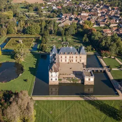 Aerial view of the moated Cormatin castle in South Burgundy, France